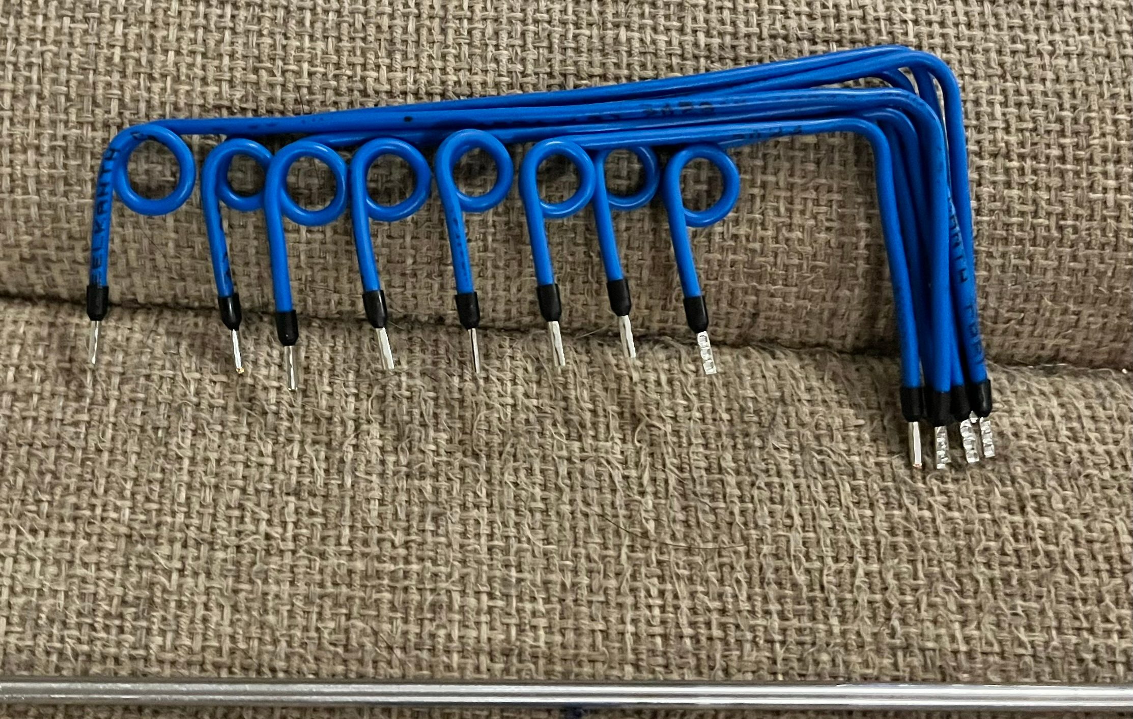 Hand wound relay return wiring inside a Crestron lighting control panel