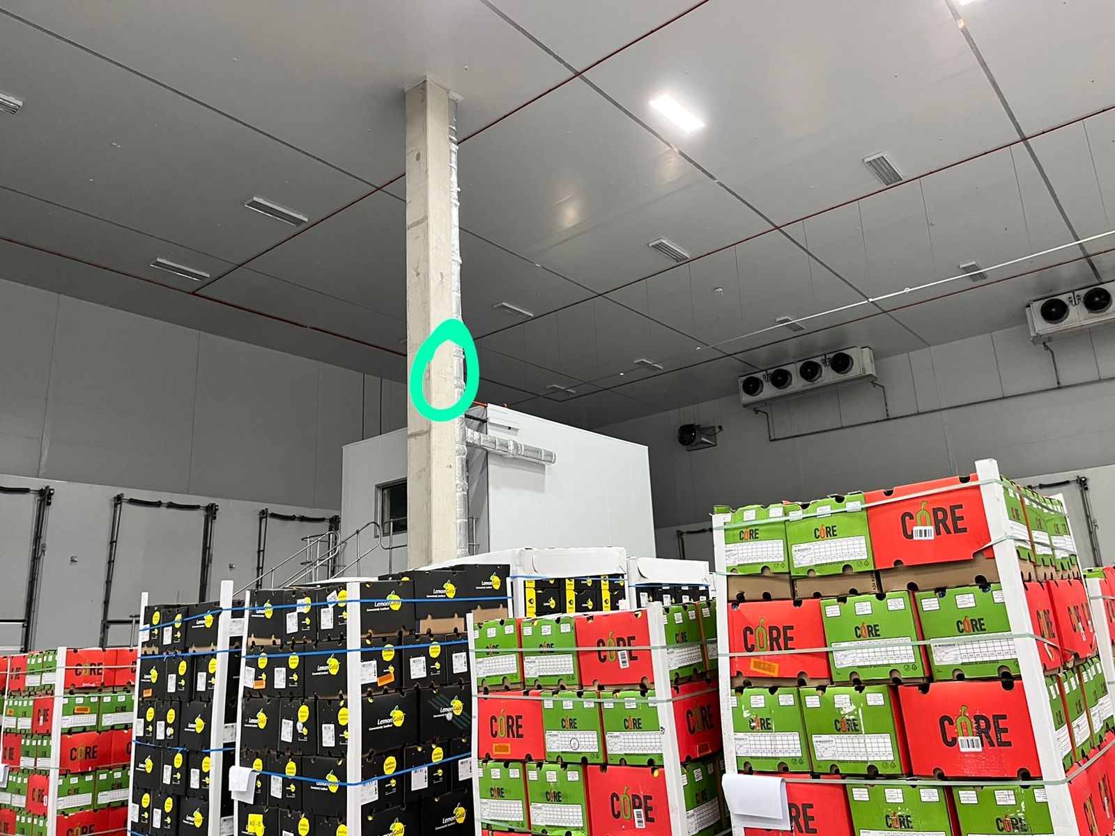 Commercial PA speaker point being marked out in a warehouse